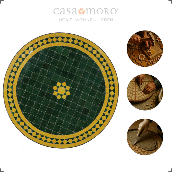 Mesa em mosaico com tampo verde e amarelo e estrutura em ferro forjado