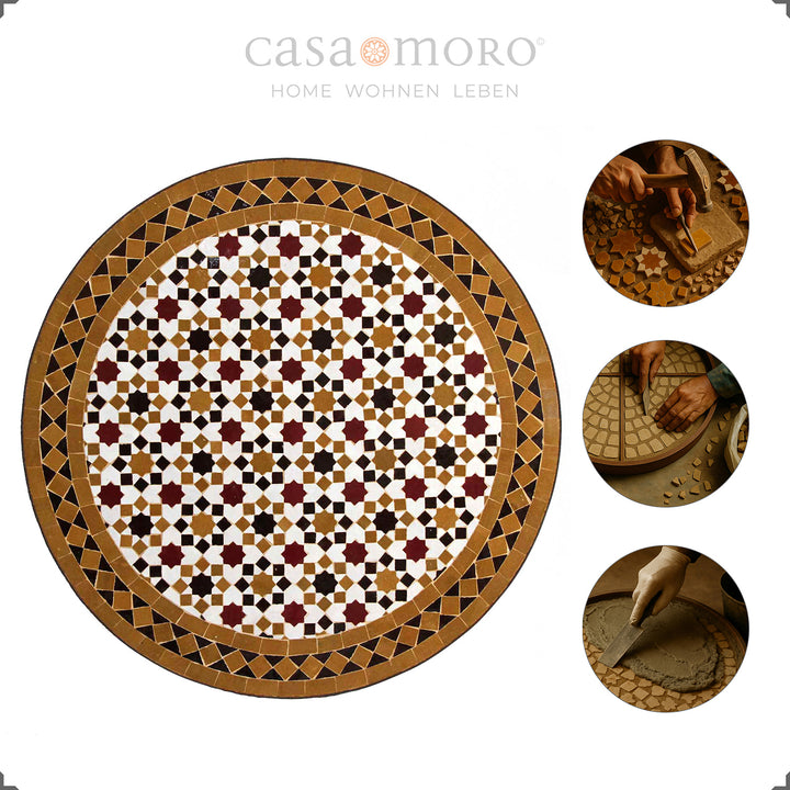 Mesa de varanda robusta com tampo em mosaico sobre uma estrutura em ferro forjado curvado