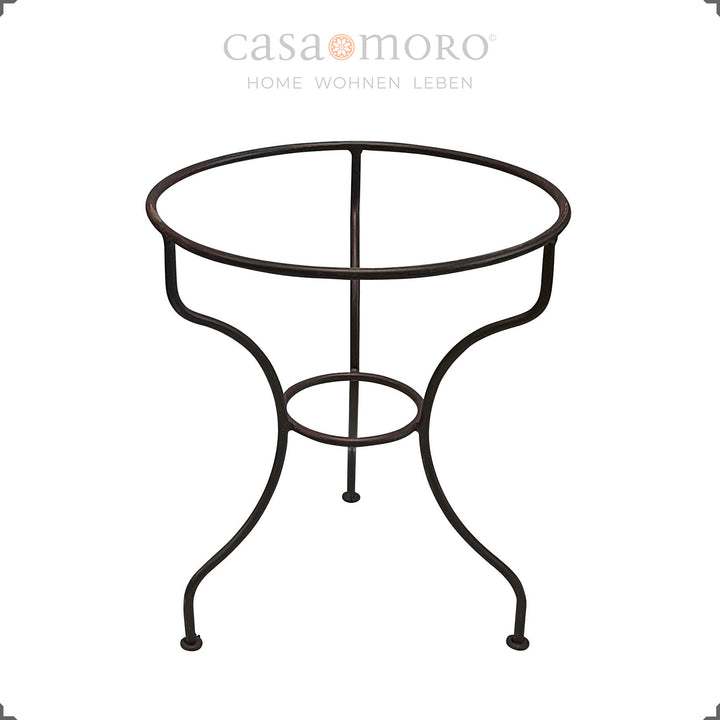 Mesa auxiliar de inspiração boho com azulejos zellige e uma estrutura robusta em ferro forjado