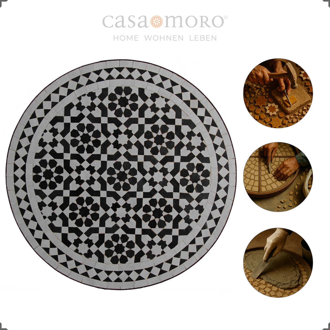 Mesa em mosaico com um padrão artístico a preto e branco e uma estrutura curva