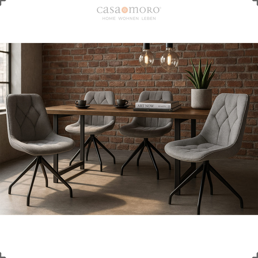 Quatro cadeiras de sala de jantar cinzentas com rotação de 360° e estrutura em metal preto – zona de refeições moderna com mesa de madeira e um estilo industrial tipo loft