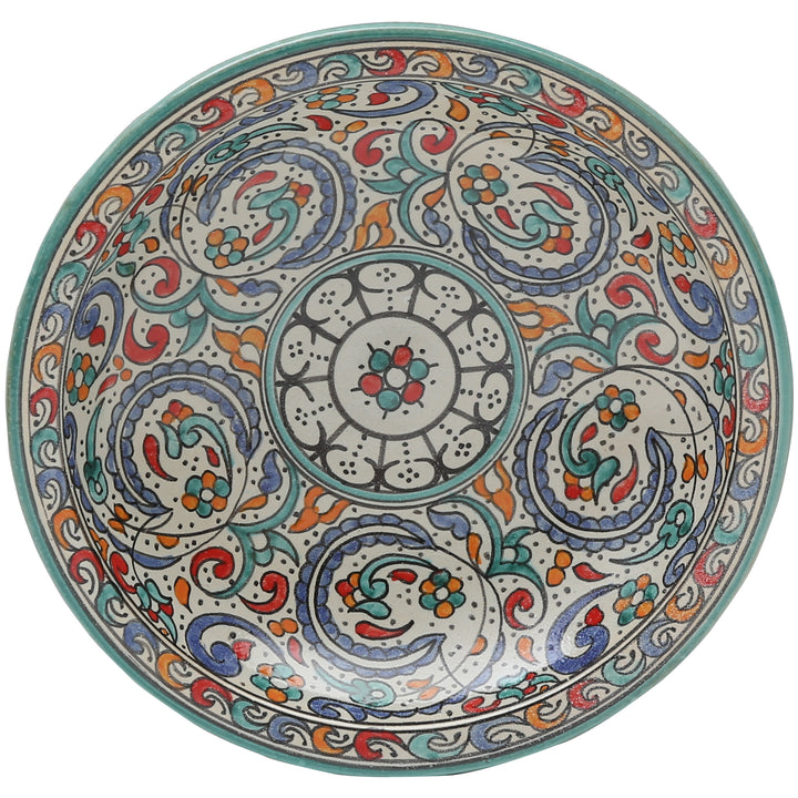 Taça de cerâmica pintada à mão, proveniente de Fez, com motivos coloridos de flores e ramos entrelaçados